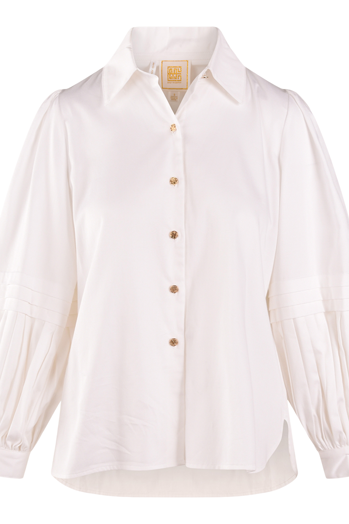 Αθηνά – Λευκή μπλούζα με χρυσά κουμπιά και πιέτες στα μανίκια